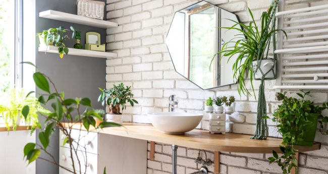 Interior,Of,Bathroom,With,Mirror,On,A,White,Bricky,Wall,